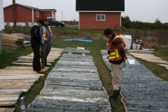 Heritage drill core being viewed by Canadian mining companies