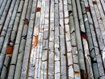 Eagle Zone drill core reveals multiple sections of quartz veined gold and silver mineralization.  These sections are saw cut for samples sent to the assaying lab.